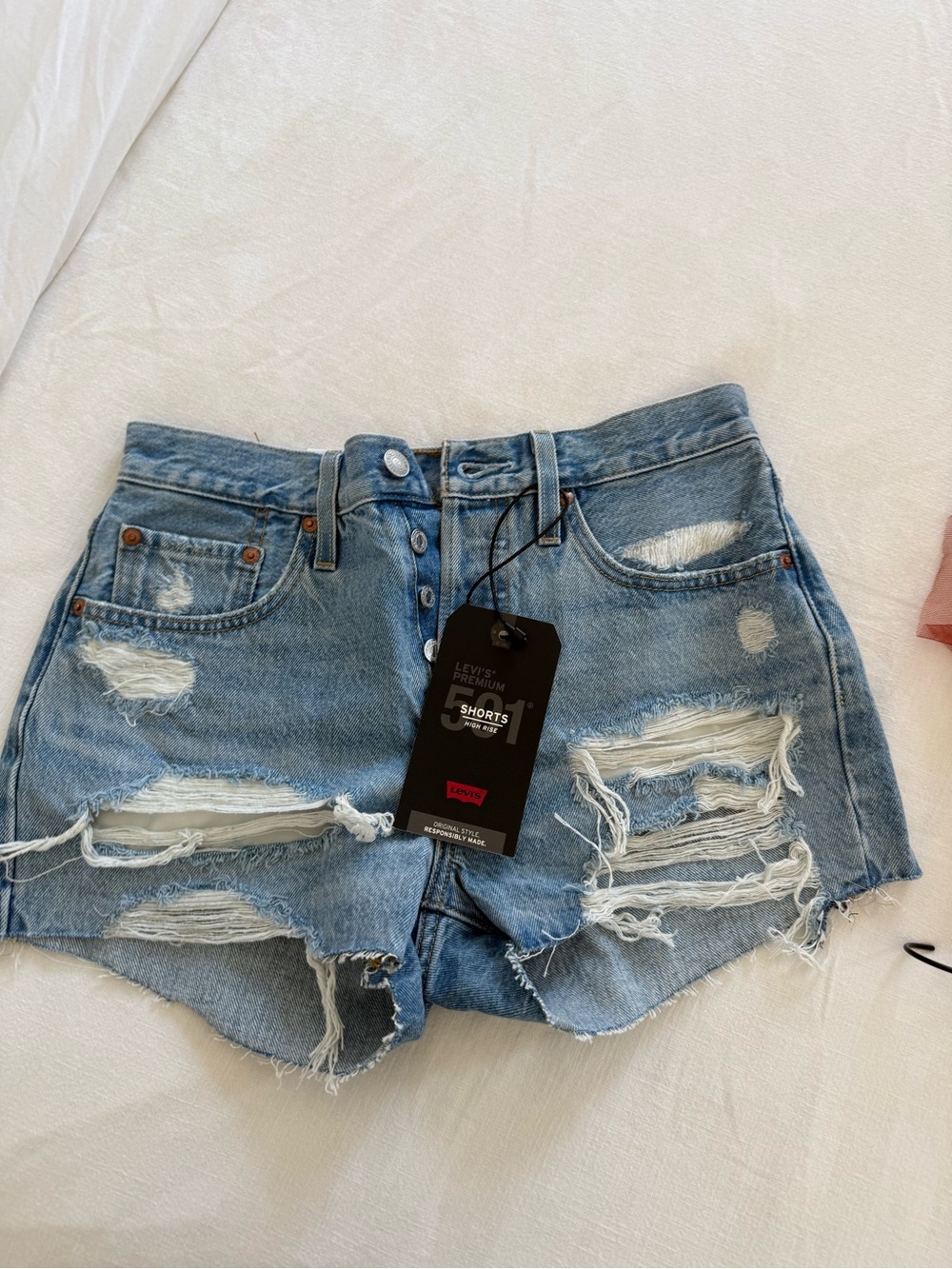 Levi's Distressed Light Blue High-Rise Denim Shorts